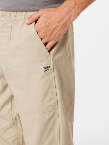 Tapered Pantaloni 'Downtown' di PUMA in beige