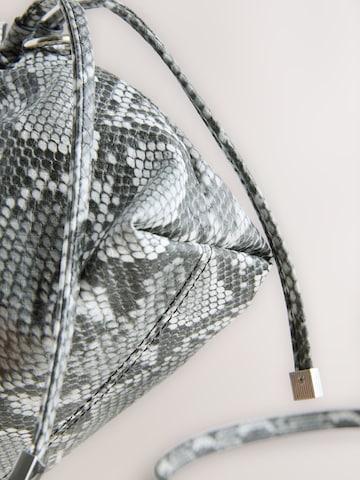 Next Clutch in Grey