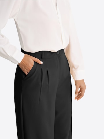Wide leg Pantaloni con pieghe di Imily Bela in nero