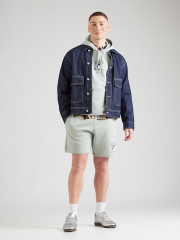 GAP Regular Housut 'DISNEY X GAP' värissä vihreä