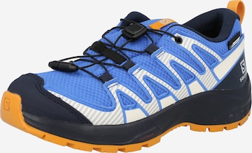 SALOMON Athletic Shoes in Blue: front