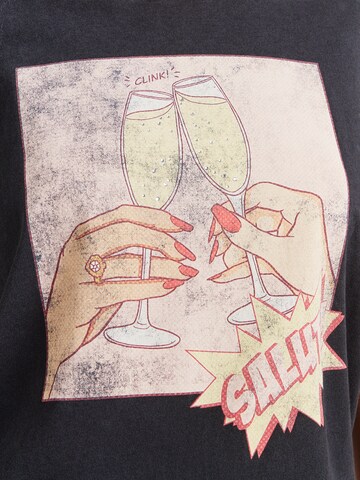 GUESS T-Shirt 'CLINK EASY' in Schwarz