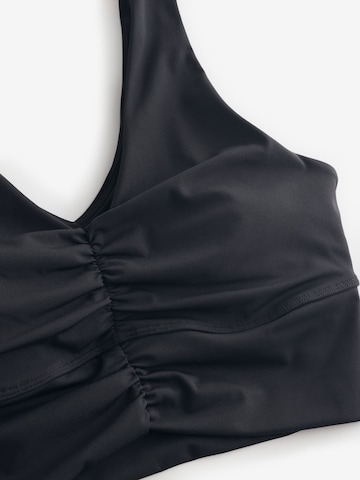 Osia - Top en negro