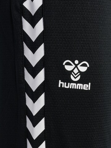 Hummel Zwężany krój Spodnie sportowe w kolorze czarny