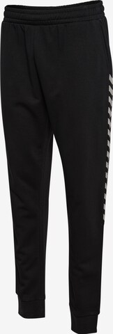 Effilé Pantalon de sport 'Staltic' Hummel en noir