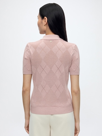 GUESS Sweter w kolorze różowy