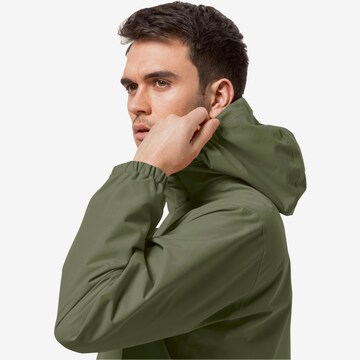 JACK WOLFSKIN - Casaco outdoor 'STORMY POINT' em verde