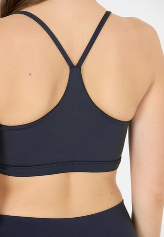 Athlecia Low Support Sport-BH 'Blossom' in Blau