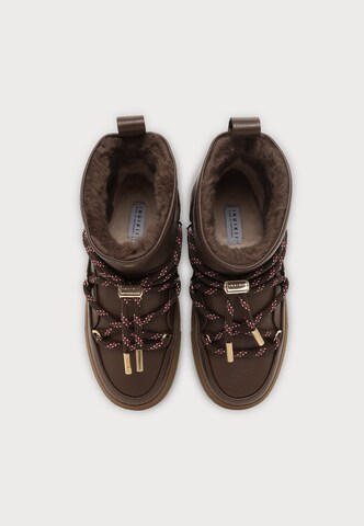 INUIKII Boots in Brown