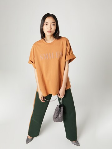 Smiles T-shirt 'Kalle' i orange