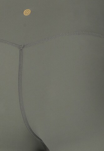 Athlecia Skinny Workout Pants 'Luxe' in Brown