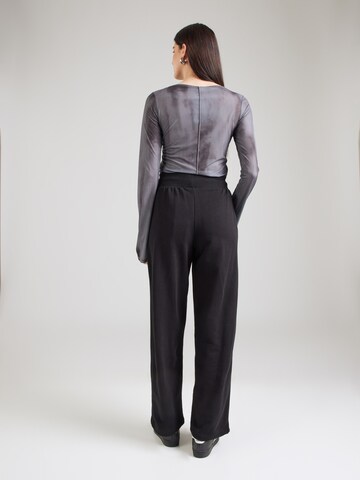 regular Pantaloni 'NEYYAN' di NEW ERA in nero