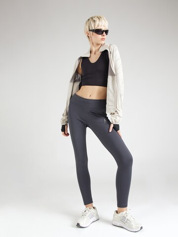 ODLO Skinny Fit Спортен панталон 'Essential' в сиво