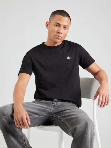 Tricou de la Calvin Klein Jeans pe gri: față
