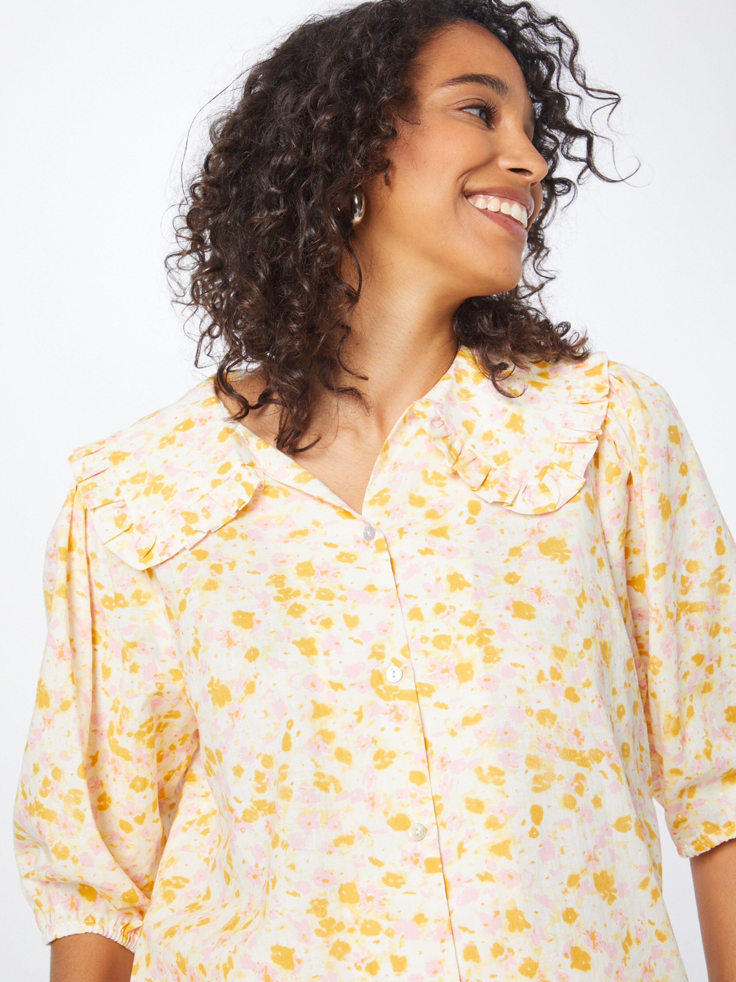 pastel yellow blouse