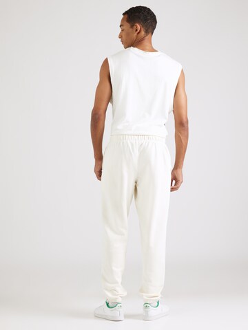 ELLESSE Конический (Tapered) Штаны 'Pideura' в Белый