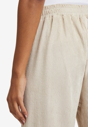 Wide Leg Pantalon Cartoon en beige