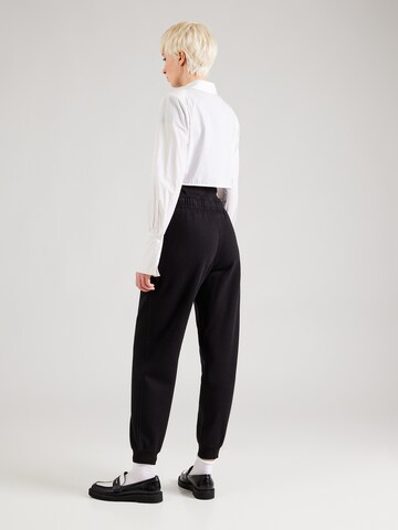 TOMMY HILFIGER Tapered Trousers 'ESSENTIALS' in Black