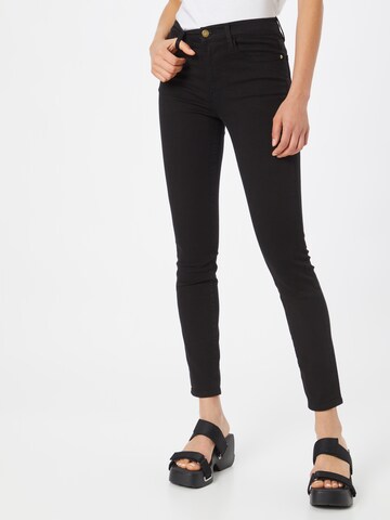 FRAME Skinny Jeans in Black: front