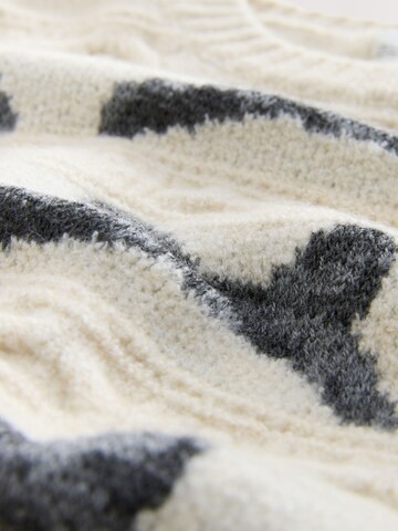 balta Next Megztinis