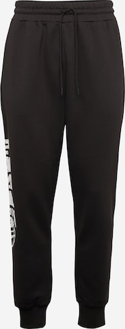 PUMA - Tapered Pantalón deportivo 'Posterize 2.0' en negro: frente