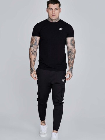 SikSilk Slimfit Sportbroek 'Essentials Poly' in Zwart