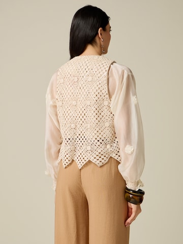 Gilet oltre en beige