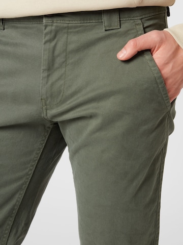 Coupe slim Pantalon chino 'SCANTON' Tommy Jeans en vert