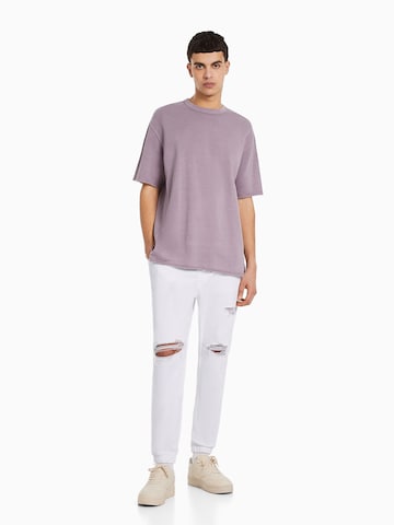 Bershka Дънки Tapered Leg Дънки в бяло