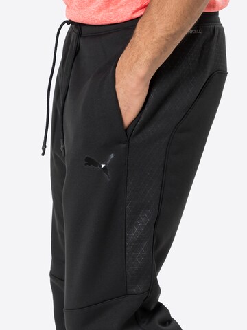 PUMA Regular Sports trousers in Black