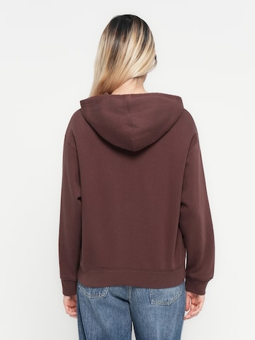 GAP Collegetakki 'Heritage' värissä ruskea