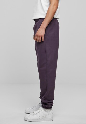 Tapered Pantaloni di Urban Classics in lilla