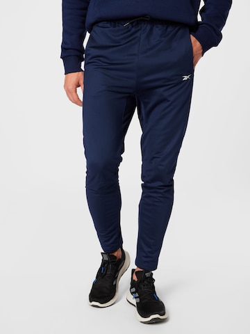 Effilé Pantalon de sport Reebok en bleu : devant