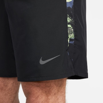 NIKE Regular Workout Pants in Black