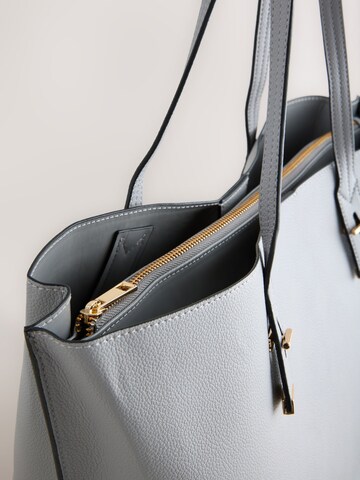 Next Shopper in Grau