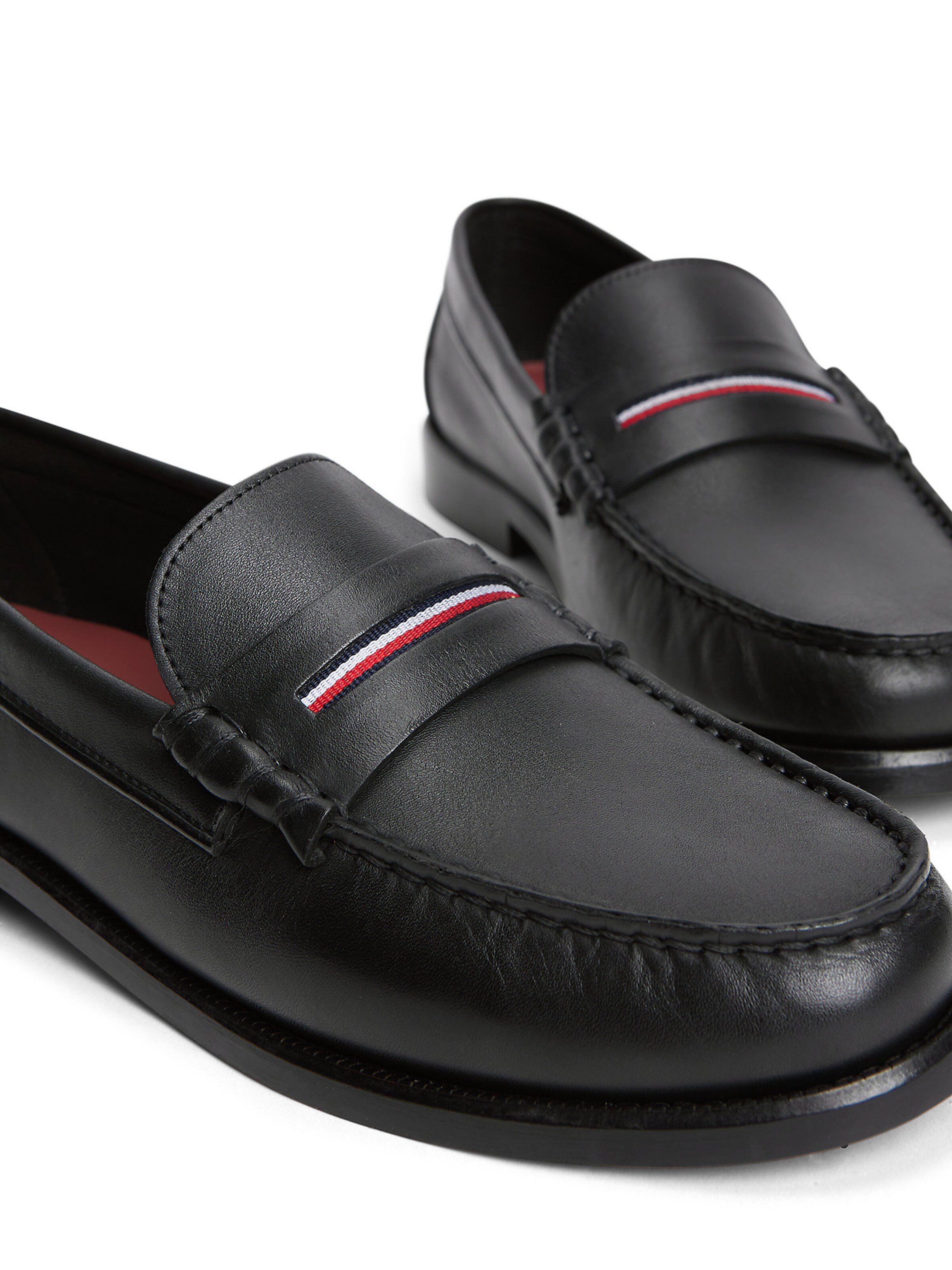 TOMMY HILFIGER Slip-ons in Black