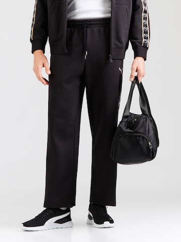 PUMA Loosefit Byxa 'ESS ELEVATED' i svart: framsida