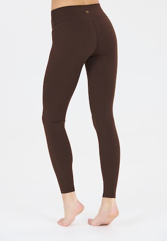 Athlecia Skinny Workout Pants 'Luxe' in Brown