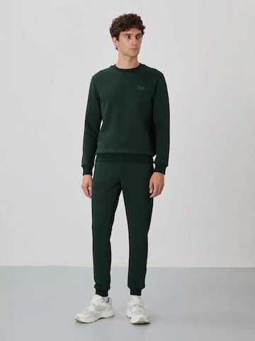 Tommy Life Joggingpak in Groen