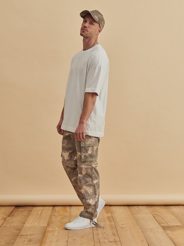 DAN FOX APPAREL Tapered Παντελόνι cargo 'Kadir' σε πράσινο