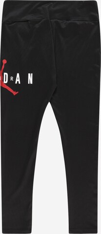 Effilé Pantalon de sport Jordan en noir