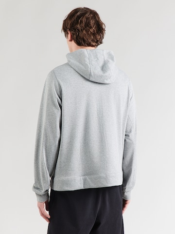 NIKE Urheilullinen collegetakki värissä harmaa