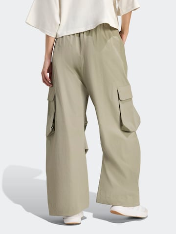 ADIDAS SPORTSWEAR - Pierna ancha Pantalón deportivo 'HERO' en verde