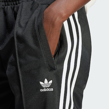 ADIDAS ORIGINALS Regular Broek 'Montreal' in Zwart