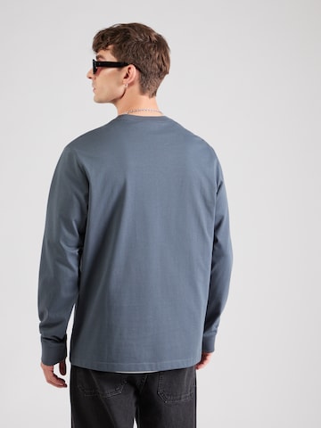 Calvin Klein Jeans - Camiseta en azul: atrás