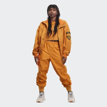 ADIDAS ORIGINALS Übergangsjacke 'Ivy Park' in Orange