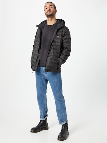 LEVI'S ® Between-Season Jacket 'Presidio Pkbl Hooded Jkt' in Black