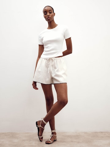 ABOUT YOU x Marie von Behrens Wide leg Trousers 'Tessa' in White
