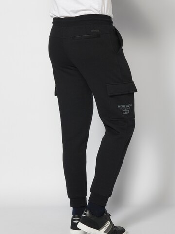 KOROSHI - Tapered Calças cargo em preto