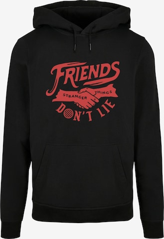 ABSOLUTE CULT Sweatshirt 'Stranger Things - Friends Dont Lie' in Black: front